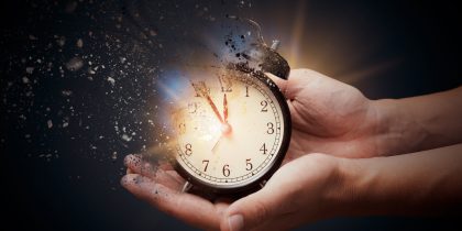 clock blowing away, symbolizing time passing by
